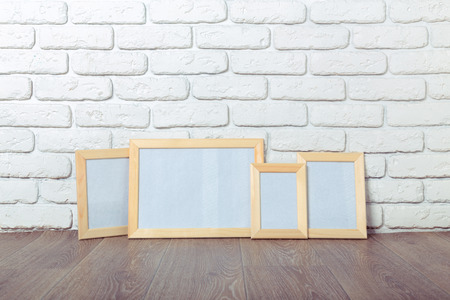 Picture frame on brick wall
