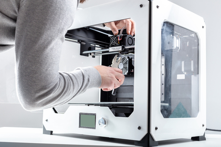 Designer Working With 3D Printer