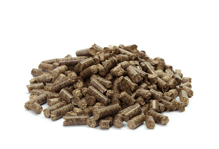 stack of wooden pellets for bio energy, white background, isolatedの写真素材
