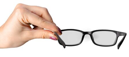 hand holding Eye Glasses Isolated on White backgroundの写真素材