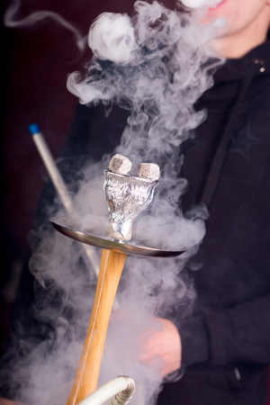 Hookah smoke on dark backgroundの写真素材
