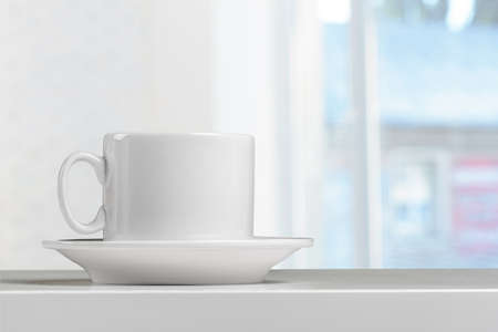 Coffee Cup on a tableの写真素材