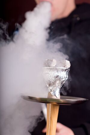 Hookah smoke on dark background