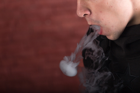 Man smoking hookahの写真素材