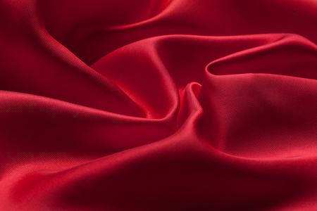 Red cloth waves background textureの写真素材