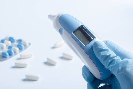 thermometer and pills