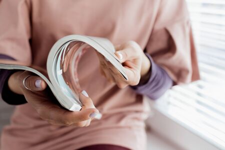woman reading a magazineの写真素材