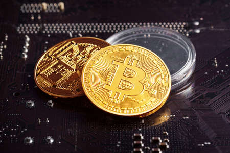 Bitcoin and a computer graphic cardの写真素材