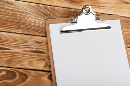 clipboard on wood backgroundの写真素材