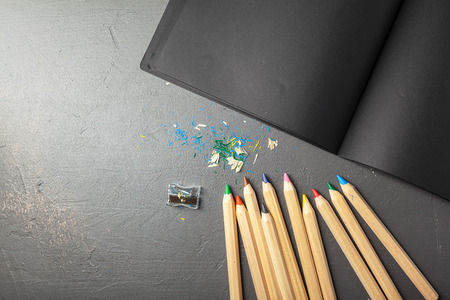 colorful pencils on gray stone backgroundの写真素材