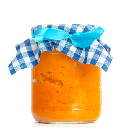 Canned vegetables in glass jars isolated on white backgroundの写真素材