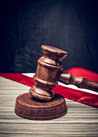 the judge gavel and background with usa flagの写真素材