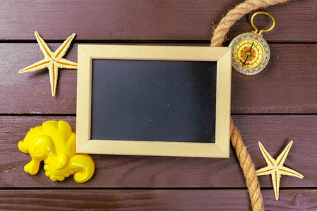 Small wooden framed blank blackboard for your designの写真素材