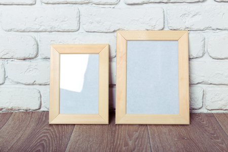 Picture frame on brick wallの写真素材