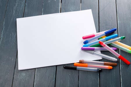 clean sheets on table with markersの写真素材