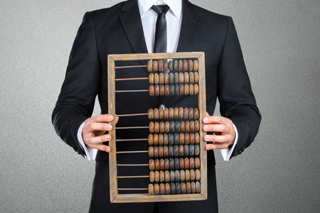 Businessman with abacus