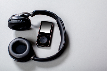 Audio Headphones with Cord on Grey Backgroundの写真素材