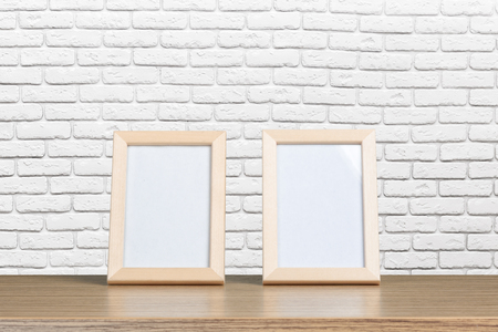 Blank whiteboard wood frame on wooden table