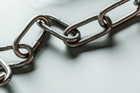 close up of metal chain part on white backgroundの写真素材