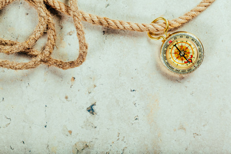 Compass on a gray gradient background