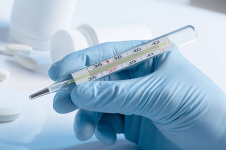 thermometer and pills
