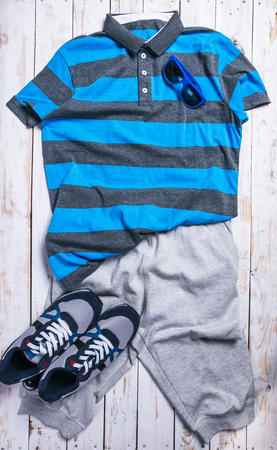 cool fashion casual men outfit on wooden tableの写真素材