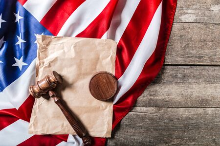 Wooden gavel and USA flagの写真素材