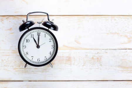 alarm clocks on wooden tableの写真素材