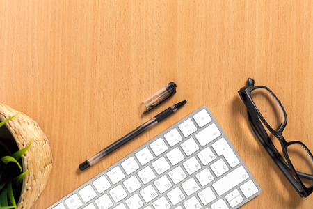 Modern working business desk with keyboardの写真素材