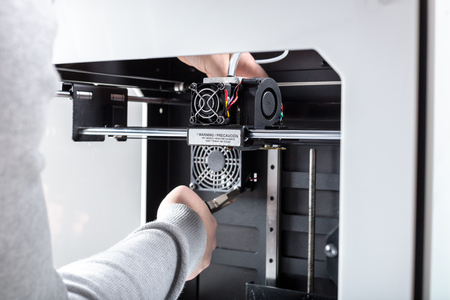 Designer Working With 3D Printer
