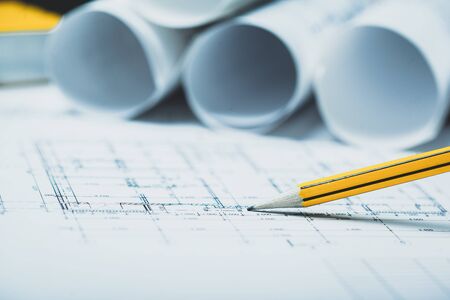 stack of white construction blueprintsの写真素材