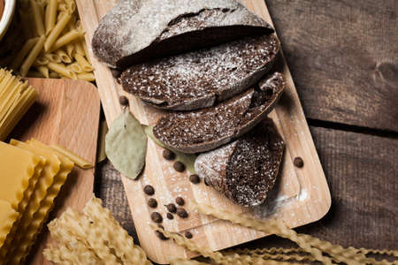 Pasta collection on rustic wooden backgroundの写真素材