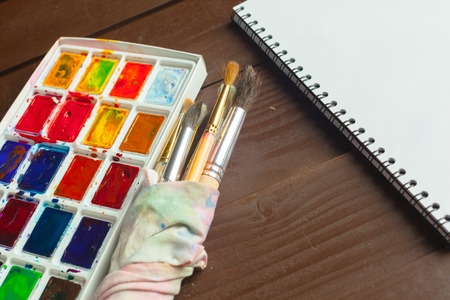 Set of watercolor paints and paintbrushes for paintingの写真素材