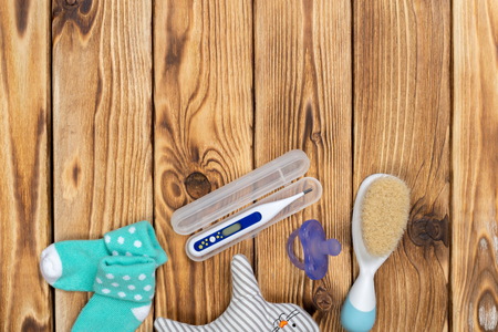 Baby accessories on tableの写真素材