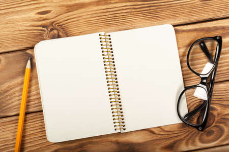 office supplies on wooden backgroundの写真素材