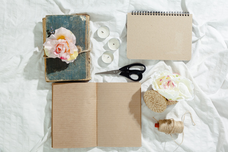 flowers with empty vintage notebook for your designの写真素材
