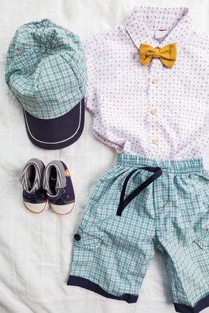 Baby boy  clothes  on white backgroundの写真素材