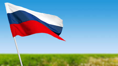 Russian flag against blue skyの写真素材