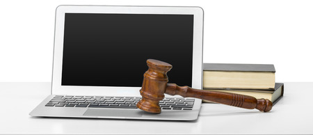 Laptop And Mallet On Table