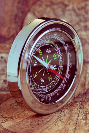 Old compass on vintage mapの写真素材