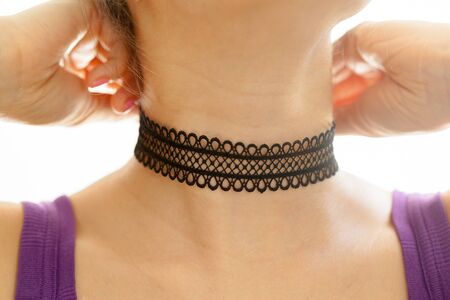 Young woman with necklaceの写真素材