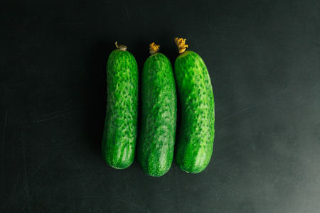 Fresh cucumber on black backgroundの写真素材