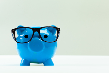 Blue piggy bank or money boxの写真素材