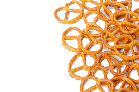 glazed and salted pretzels isolated on white backgroundの写真素材