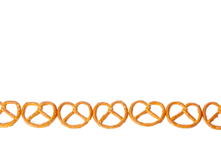 glazed and salted pretzels isolated on white backgroundの写真素材