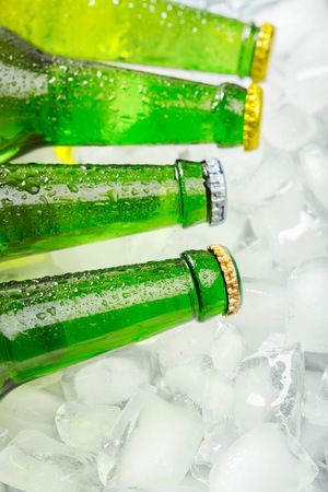 Bottles of cold and fresh beer with iceの写真素材