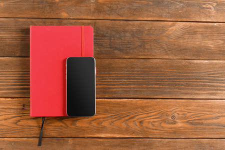Notepad on the wooden desk table