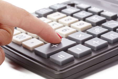 black calculator isolated on white backgroundの写真素材