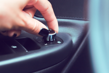 Control panel on the armrest of the car doorの写真素材