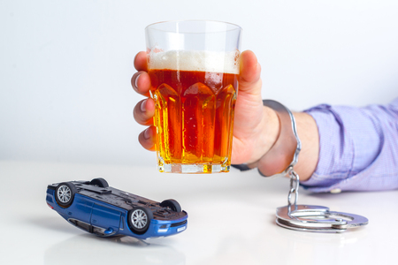 Drunk Driving Concept - Beer, Keys and Handcuffsの写真素材